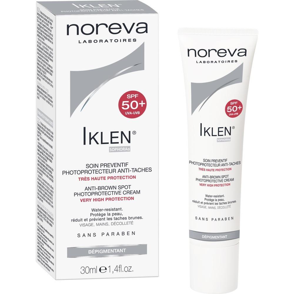 Weißer Karton und Tube mit Sonnenschutzcreme SPF 50+ von Noreva Iklen.